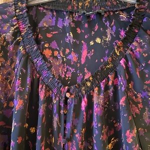 Perfect work blouse.  Size 2x purple pink yellow colors on a black background.
